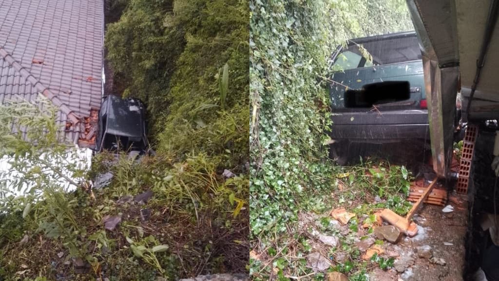 Mulher dá ré em veículo, que despenca de 20 metros e cai sobre casa