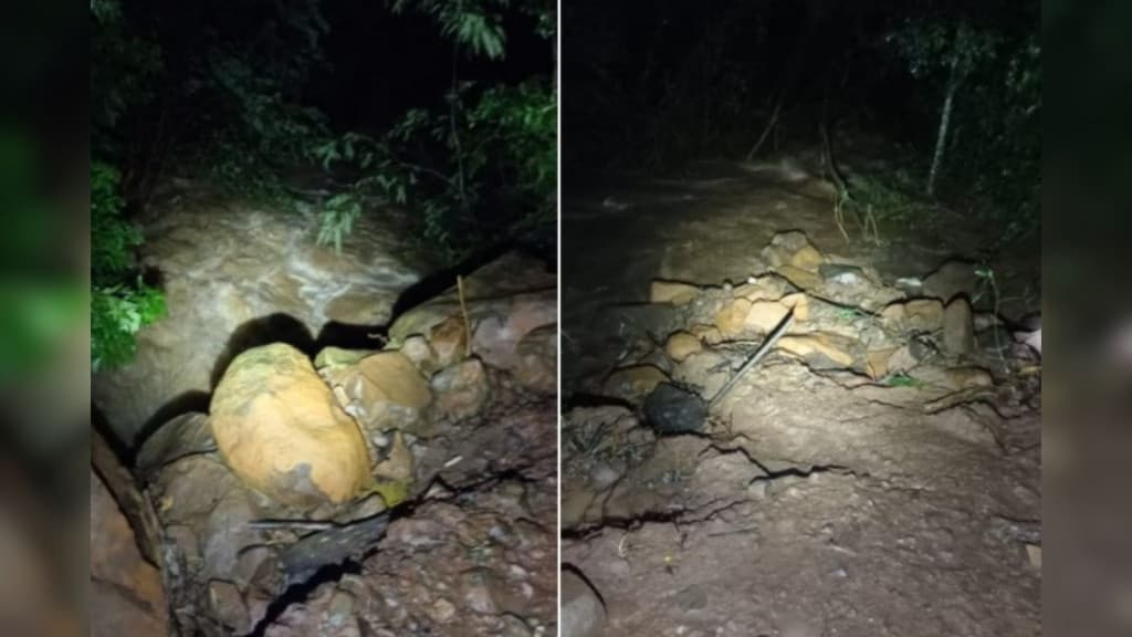 Moradores salvam motociclista arrastado por rio